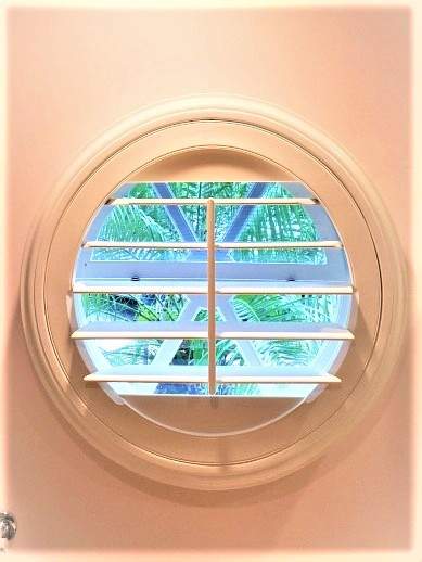 Round window with a Shutter