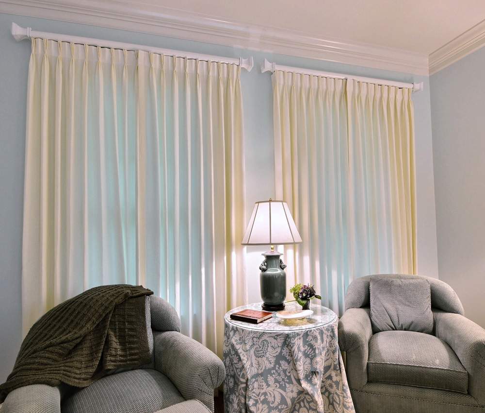 drapery and rods in living area 