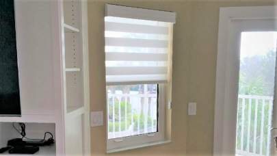 Hunter Douglas Banded Shade in small window 