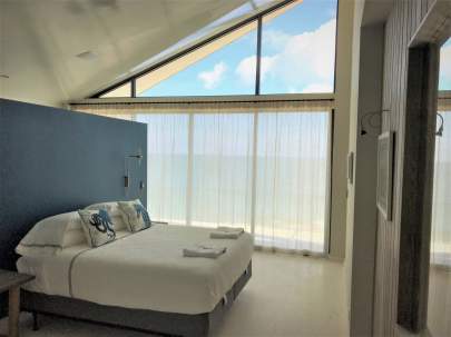 Sheer Curtains on ocean view bedroom window